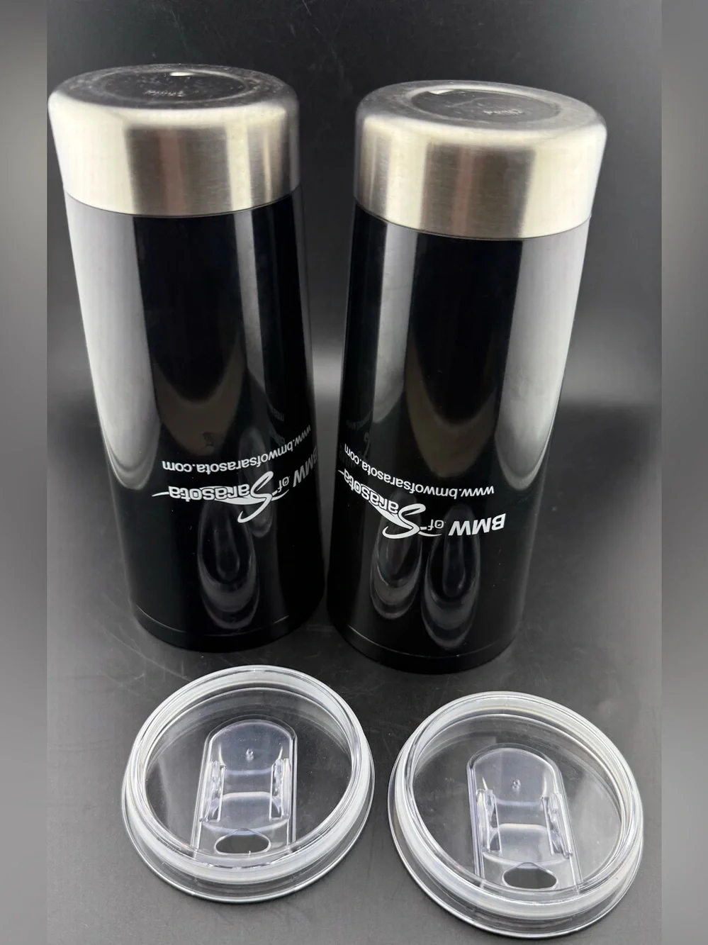 2 New BMW of Sarasota drink tumblers with sealed lids. 22oz